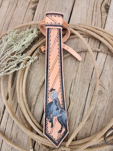 Handtooled leather tie: bucking bronc